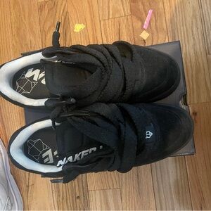 Naked Wolfe kosa size 12